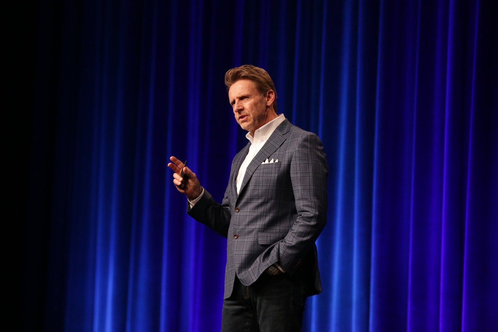 Board retreat facilitator and leadership event speaker Nicholas Webb presenting on stage